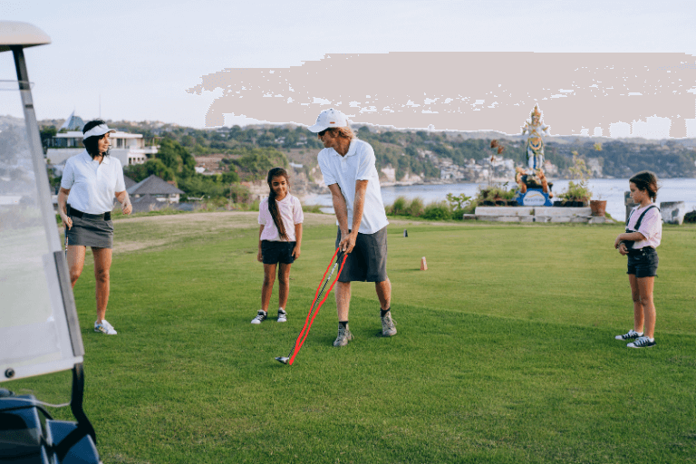 Some people playing golf.