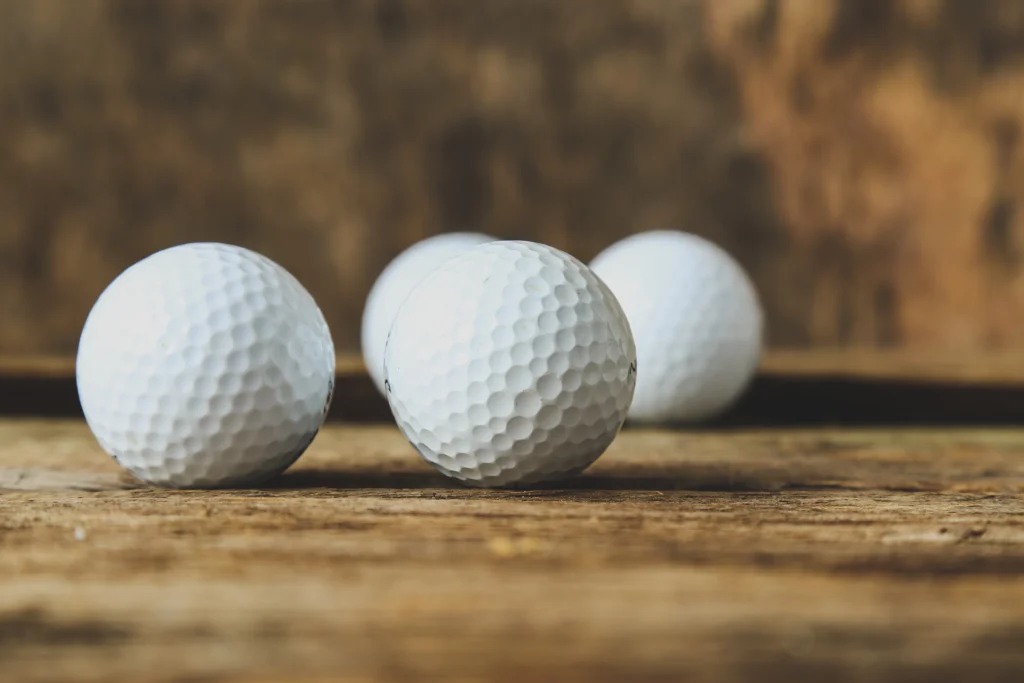 Some golf balls on the table